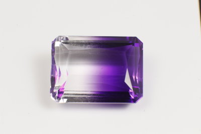 Камень фиолетово-золотистый Аметрин лабораторный 27.55 карат арт. 10453